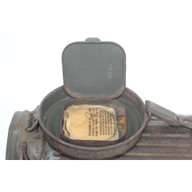 Camouflaged gas mask canister 1940